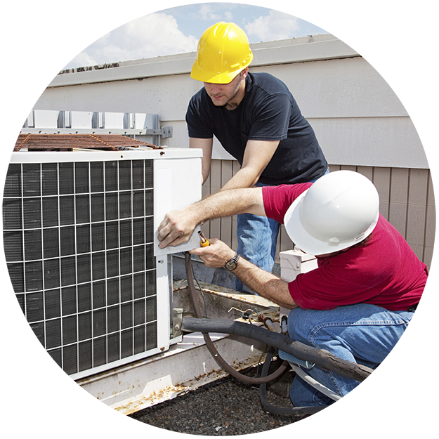 photo of two construction workers upgrading an HVAC unit