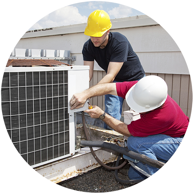 photo of two construction workers upgrading an HVAC unit